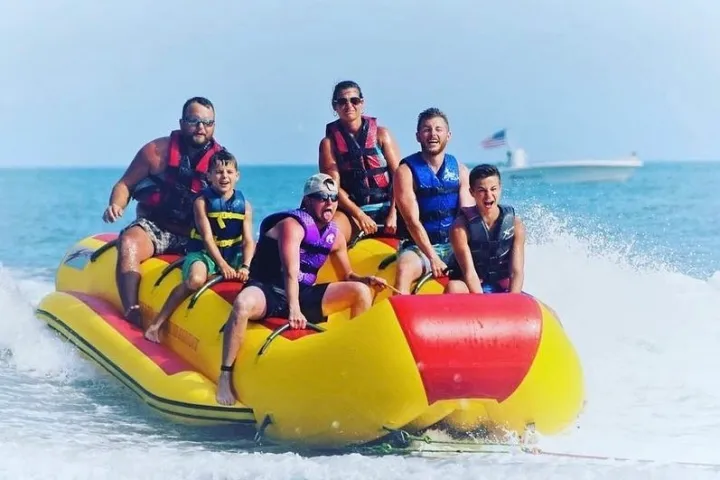 A group of people on a banana boat ride in Myrtle Beach