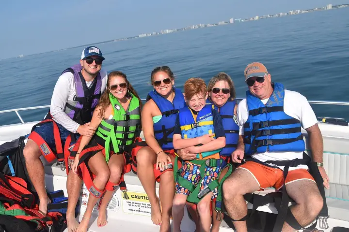 a group of people going parasailing in Myrtle Beach, SC