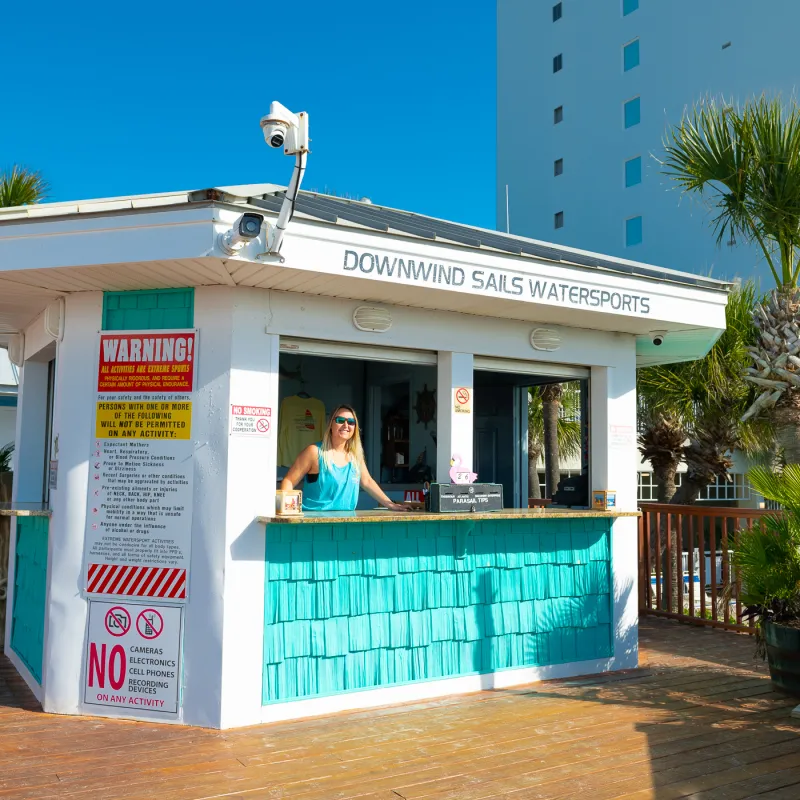 a house that has a sign on the side of a building